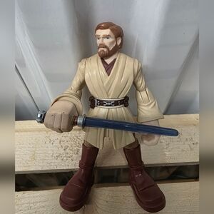 Hasbro Beige and Brown Action Figure with Blue Lightsaber